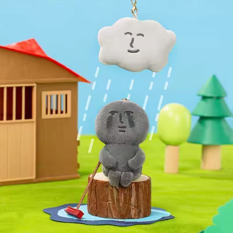 灰色のピンクのウサギは周辺のMyFriendオリジナルの変装シリーズのぬいぐるみのキーホルダーのプレゼントをいじります。|undefined