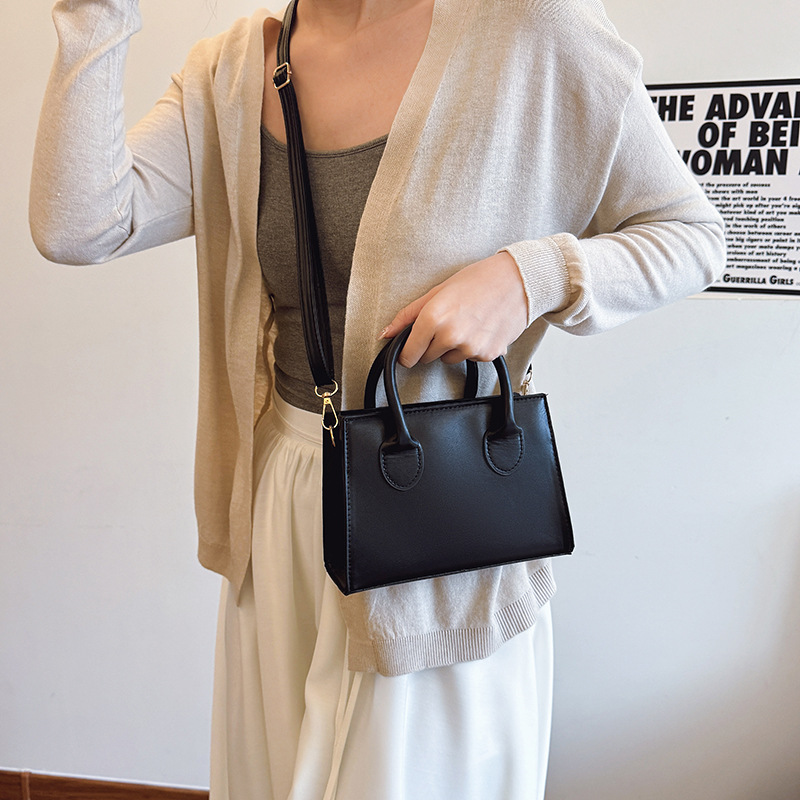 Bolso de mensajero femenino con textura de línea de moda 2025 nuevo bolso femenino portátil de moda de todo fósforo bolso cuadrado pequeño de gran capacidad de cercanías
