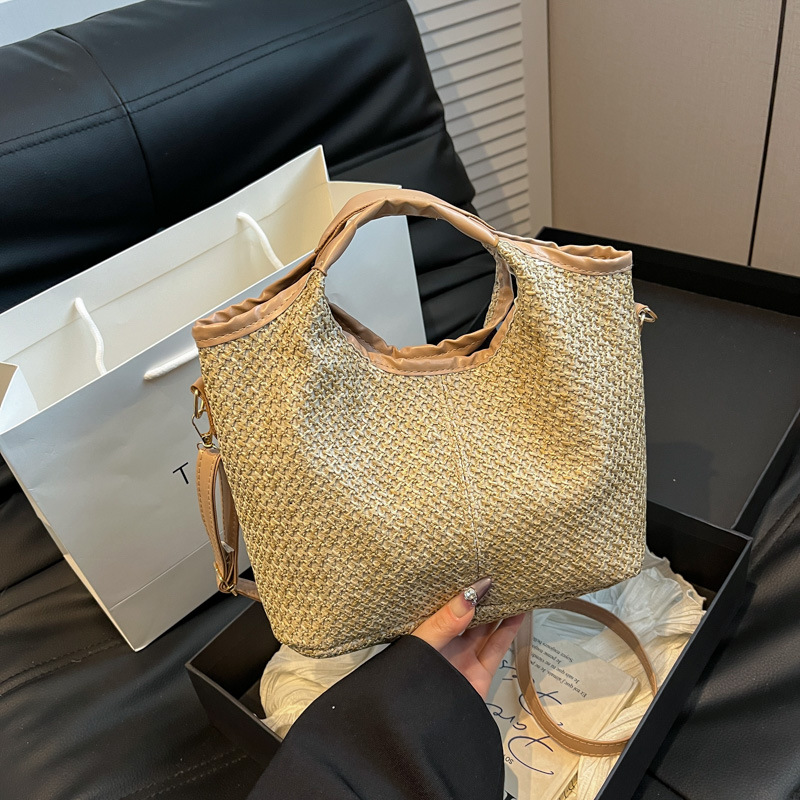 2025 este año popular bolsas de tejido de mano de mujer moda de estilo extranjero bolsa de hombro bolsa de viaje de playa bolsa de paja