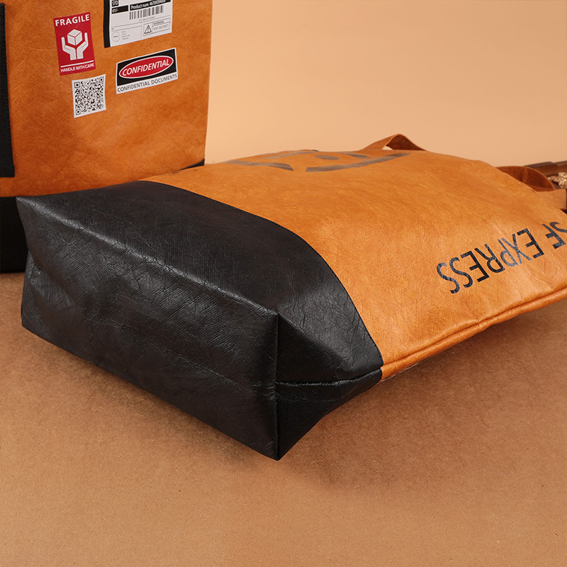 Bolsas de papel DuPont personalizadas logotipo lavable bolsa kraft no desgarrable bolsa de regalo de hombro tote personalizado