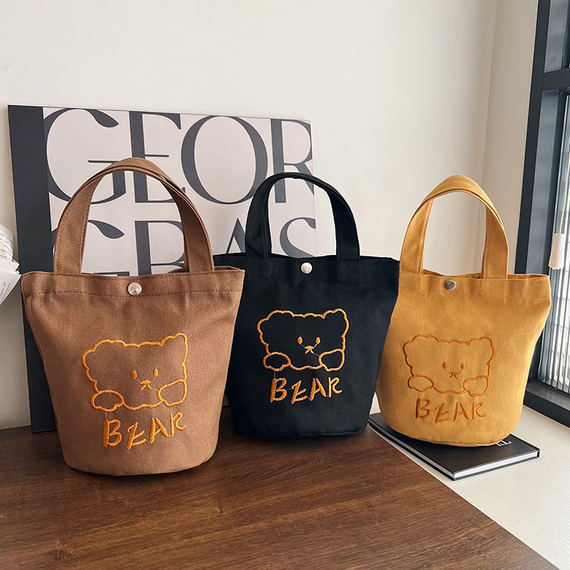 Personalized ladies' bucket bag, versatile and cute canvas bear wholesale, simple Japanese style new handbag undefined