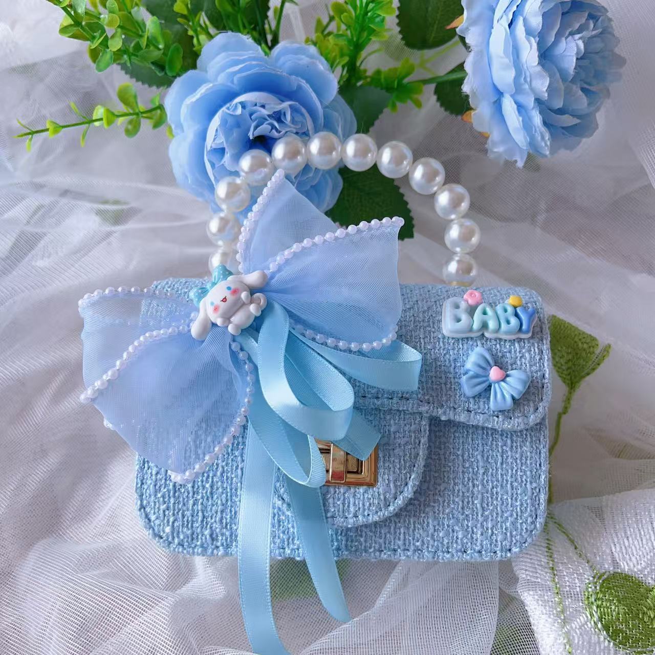 Nuevo tipo de bolsos para niños, bolsos de moda, bolsos de princesa de viento, bolsos portátiles lindos para chicas, bolsos de red para bebés.