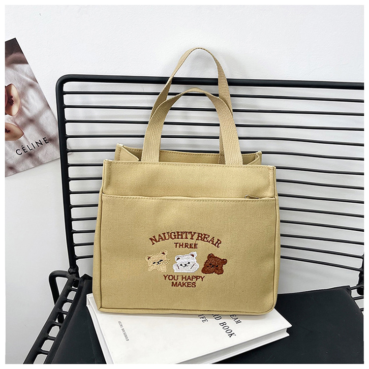 New wholesale fashionable and high-quality canvas handbag, simple and portable, easy to carry for going out, versatile lunch box and bento bag undefined