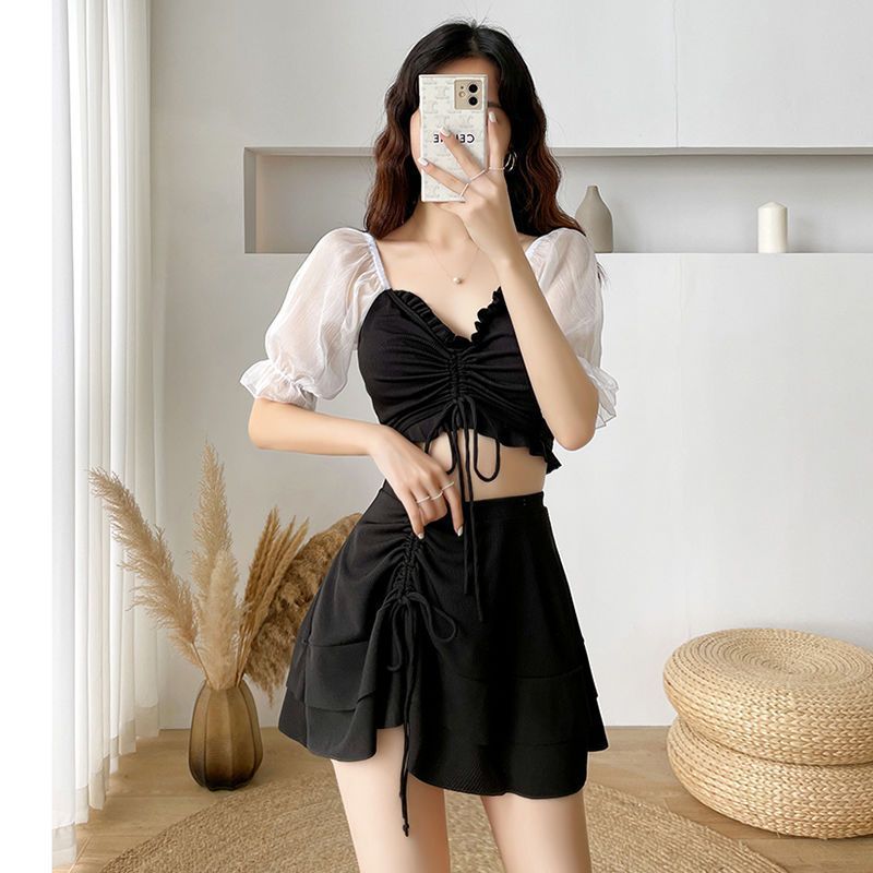 Trajes de baño para mujeres de verano split falda super inmortal sexy estudiantes vacaciones de playa cubrir el estómago spa trajes de baño de pecho pequeño comercio exterior