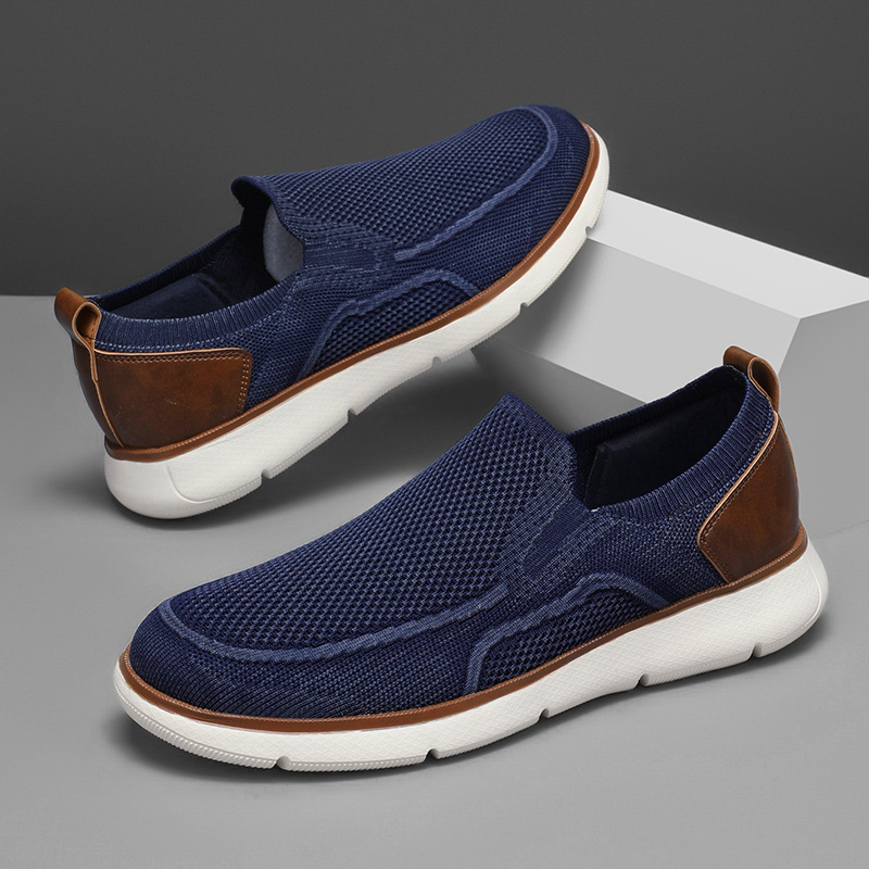 Nuevos zapatos de moda casuales retro transfronterizos de gran tamaño transpirables de malla voladora para niños con un pie zapatos de hombre ligeros y antideslizantes