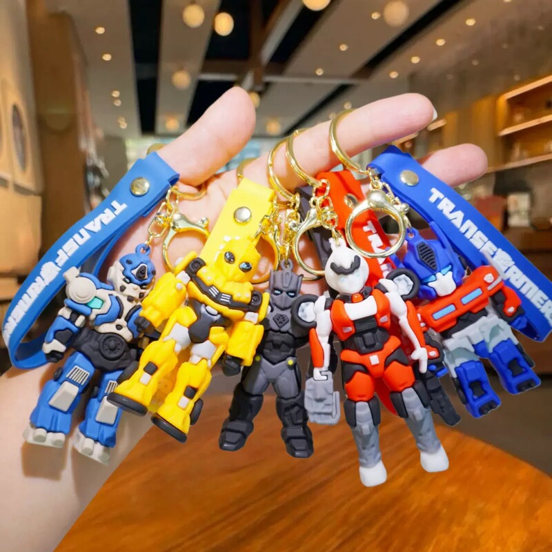 Cartoon Transformers keychain, 3D robot figurine, backpack charm, car keychain, small gift wholesale Cartoon Transformers keychain, 3D robot figurine, backpack charm, car keychain, small gift wholesale