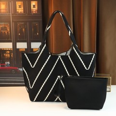 ニッチデザインインストライプニットショルダーバケットバッグ春と夏の新しい多用途ファッション大容量ハンドバッグ女性