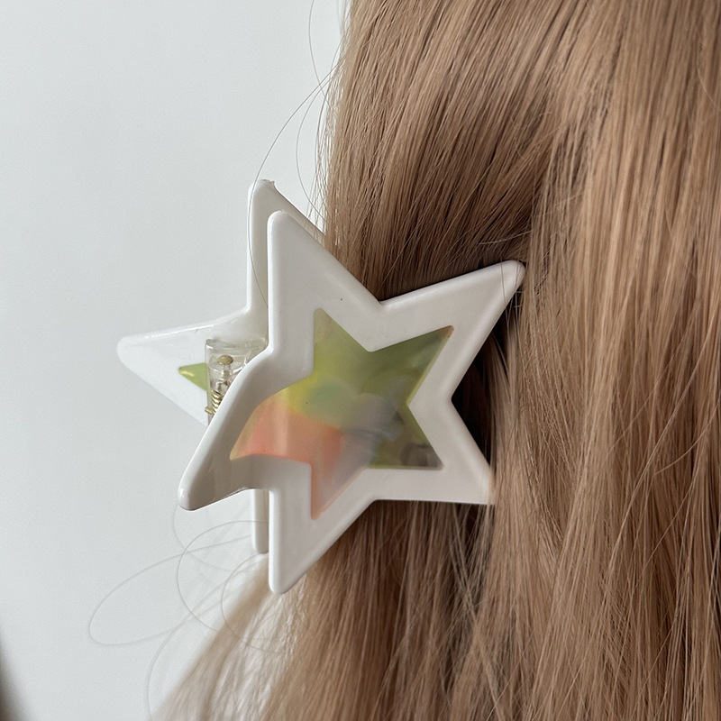Gouden haarklem met ster design elegante haarclip voor dames_voghion.com