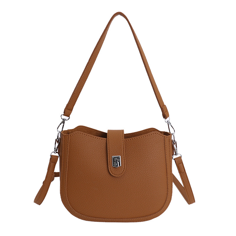 Hot sale nuevo nicho coreano litchi estampado bolso de cubo de hombro para mujeres sensación de lujo ligero versátil bolso de transporte de viaje