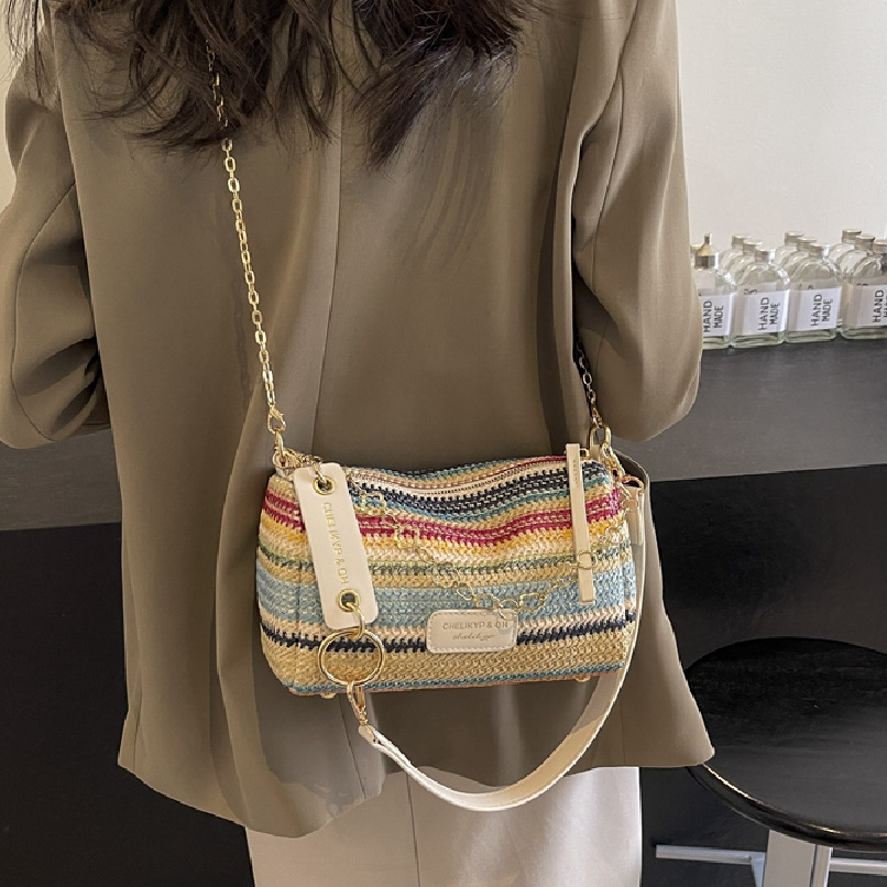 Nicho de diseño sensación de bolso de paja para mujeres verano 2024 nuevo popular bolso de cadena de hombro bolso de brazo