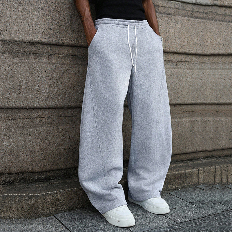 Comercio exterior transfronterizo Europa y América ropa de hombre Amazon para aliexpress cuerdas de dibujo sueltas pantalones de cuchillo de abrigo de tamaño grande en stock