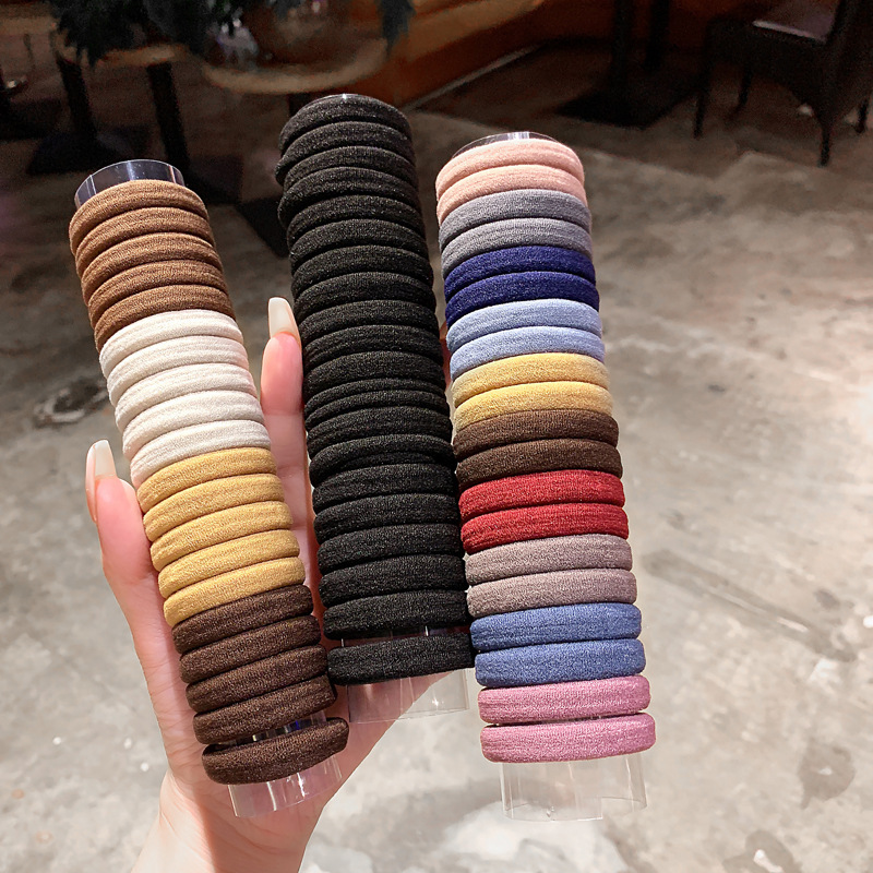 韓国版の20本の缶の高弾力の紐は継ぎ目がないゴムの女性が頭を刺しても髪を傷つけません。|undefined