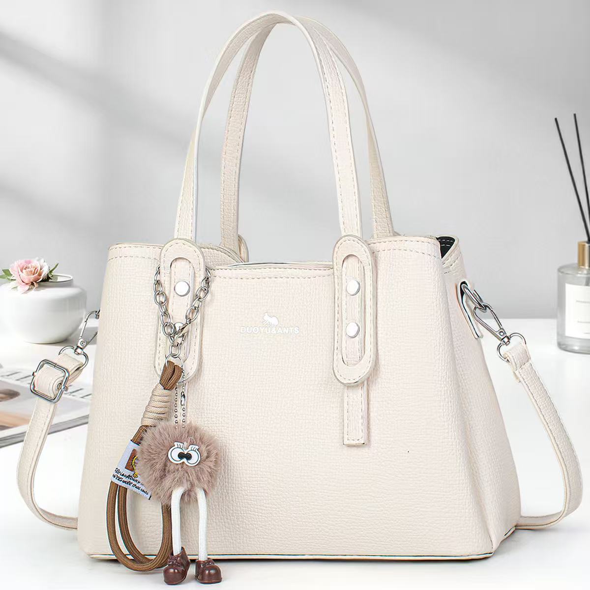 Casual muñeca colgante bolsos de mano simple bolsos de hombro de color sólido bolsos de moda bolsos transfronterizos