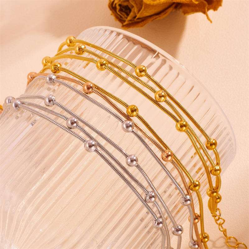 Cross-border New Stainless Steel Three-color Three-layer Steel Bead Bracelet Waterproof Color-retaining Round Snake Clip Bead Bracelet for Women