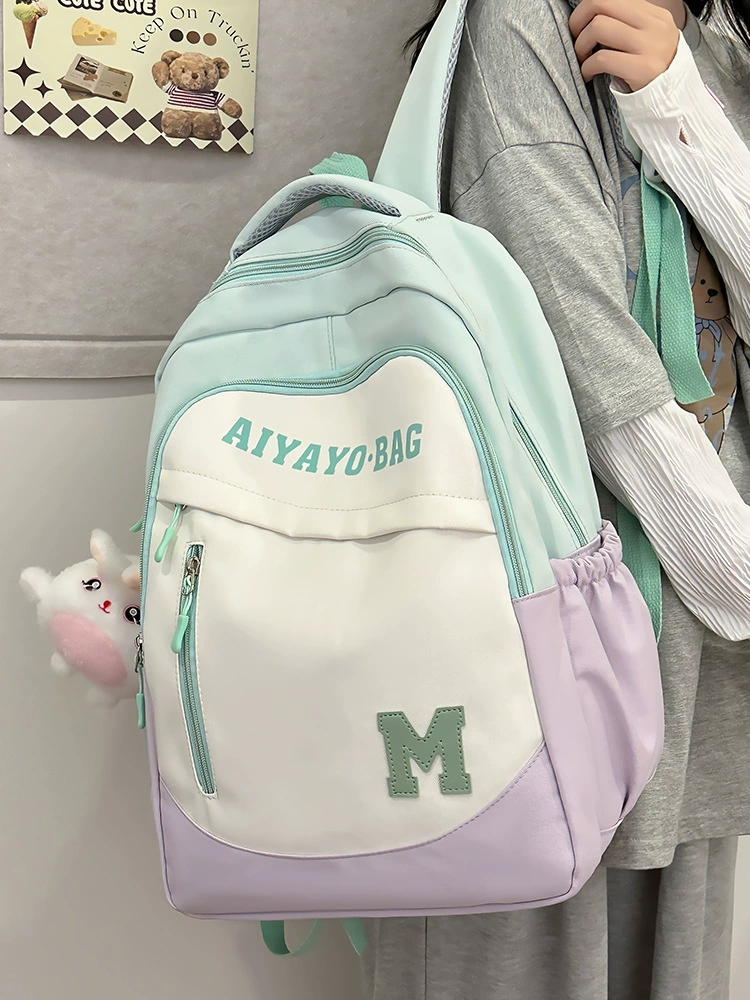 Capacious backpack, waterproof wear-resistant small school bag, simple and elegant design