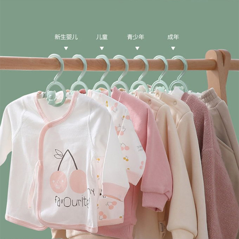 Percha de ropa infantil multifuncional especial para bebés y niños pequeños ropa de secado plástico retráctil recién nacido soporte de ropa antideslizante