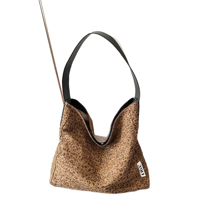 Retro leopardo bolso tote mujer 2025 nuevo nicho leopardo bolso sucio gran capacidad bolso de cubo de hombro casual