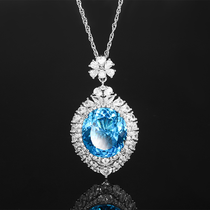 2024 nueva joyería Zhuang Shengsheng fondo de cobre chapado en oro simulación nido de pájaro cortado en forma de huevo colgante de lujo ligero piedra principal 18*20