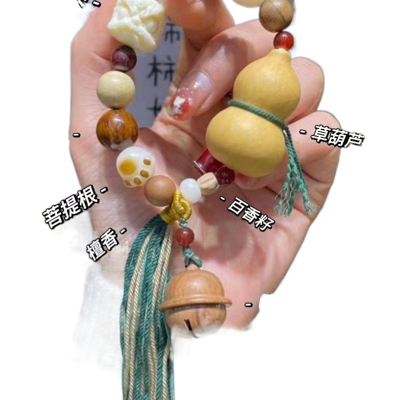 菩提手串は多宝手串星月走環紫檀目を覚ます獅子の象牙の実を持っています。|undefined