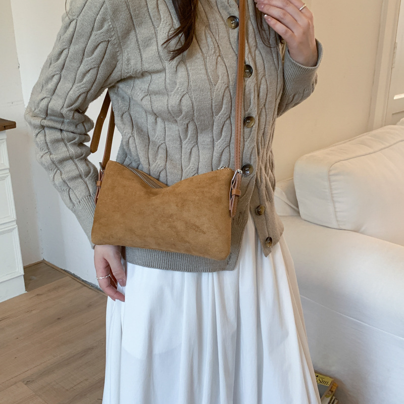 Transfronterizo 2025 invierno leopardo nuevo retro bolso de brazaleta de moda de mujer bolso de hombro de estilo extranjero bolso de transporte universal