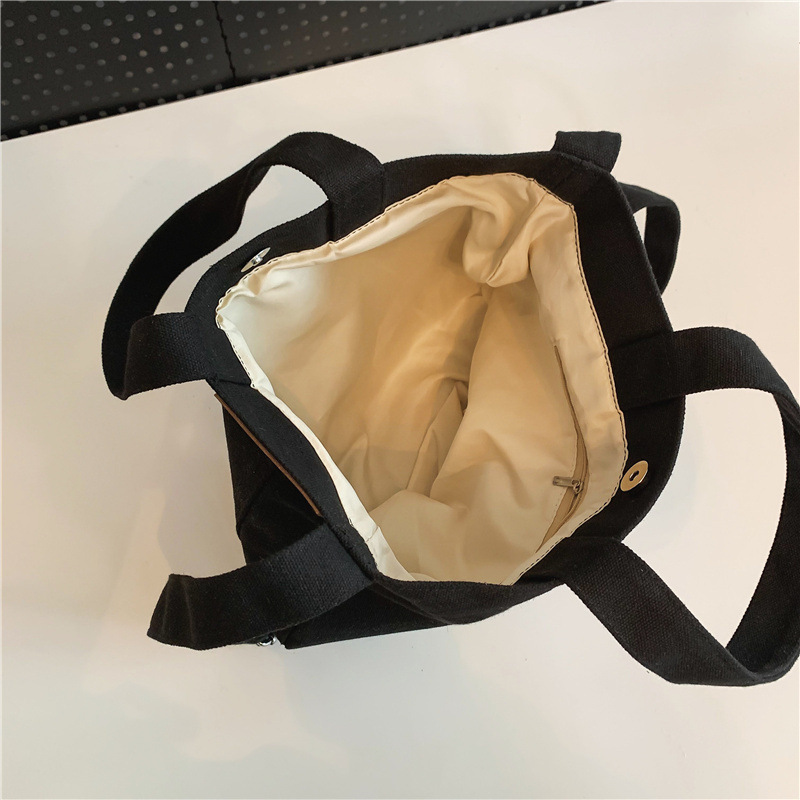 Bolso de lona para mujer 2024 nuevo bolso de viaje simple bolso de mano informal bolso de mensajero de hombro para estudiantes