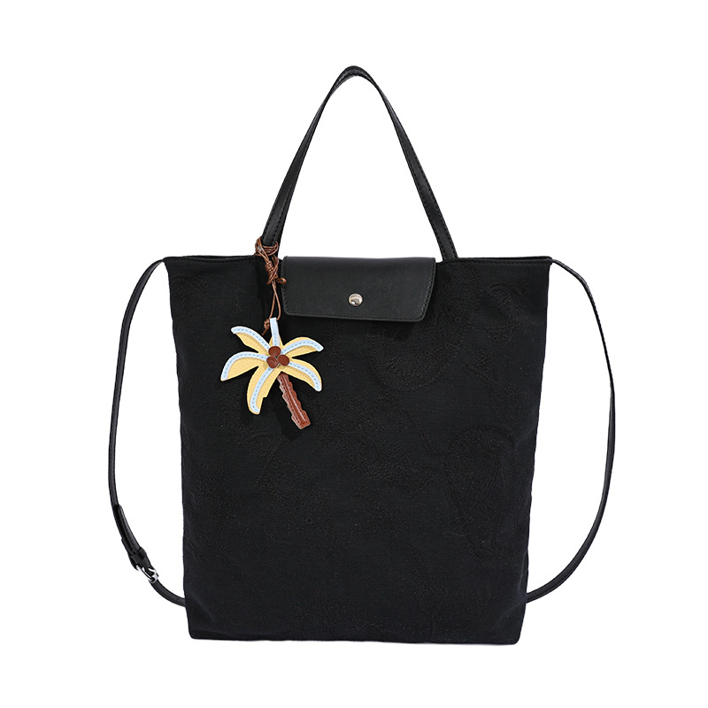 Bolso de mujer 2026 nuevo estilo coreano tela de gran capacidad bolso de mano de viaje simple diario mochila de hombro