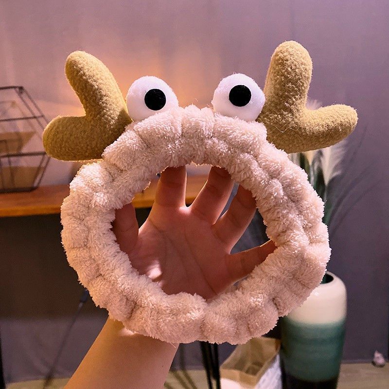 Estilo coreano celebridad de Internet ojos grandes cornisa banda de pelo animal de dibujos animados banda de pelo mascarilla banda de pelo femenino accesorios para el cabello al por mayor