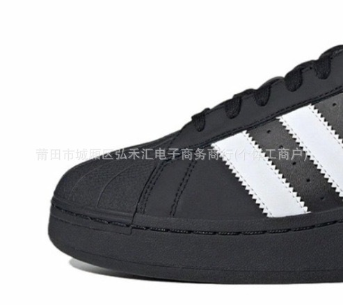 Black shell-thick sole (gold label on tongue)