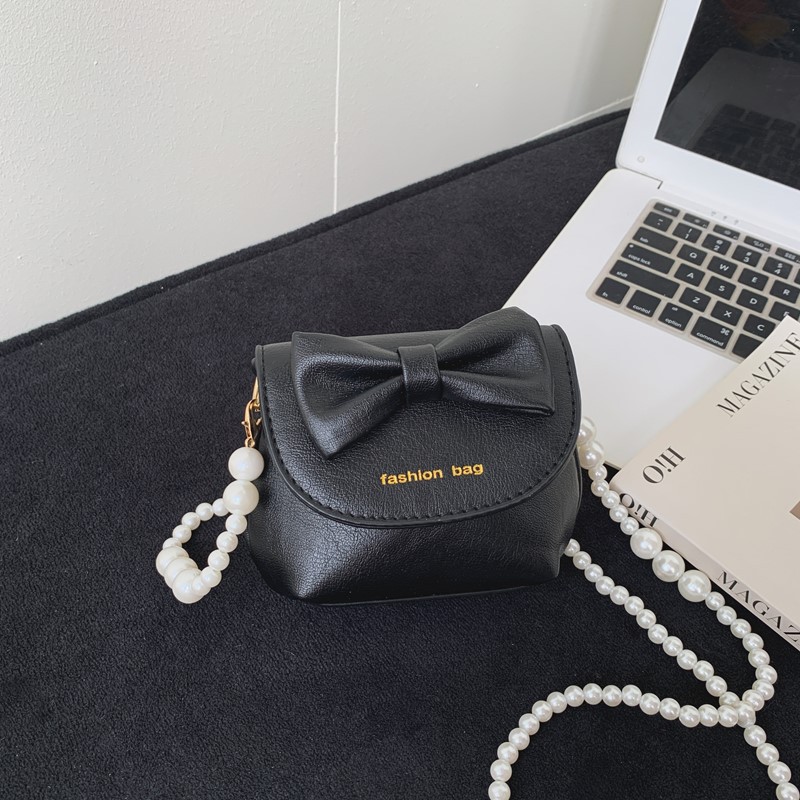Cute mini niñas bolso de hombro dulce perla bolso de bebé coreano nuevo bolso de cambio de color sólido para niños
