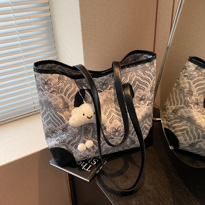 Nueva bolsa de hombro de gran capacidad de estilo chino para mujeres 2024 otoño nuevo estilo de alta calidad de impresión de patrón de montaña y mar bolsa especial