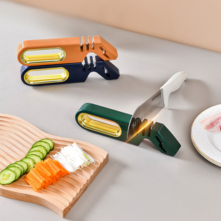 Four-in-one knife sharpener four-stage Kitchen fast sharpening stone manual sharpening tool household grinding scissors spot wholesale
