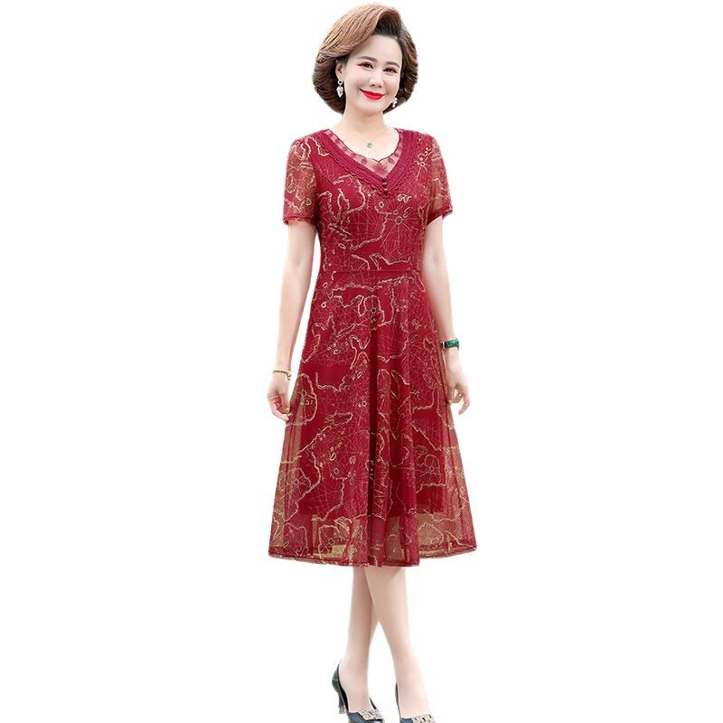 中年のお母さんの婦人服の半袖のワンピースの夏服の洋風の百塔の気質の大きいサイズの新型はやせている中高年のスカートを現します。|undefined
