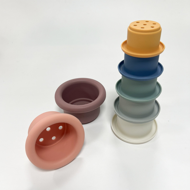 Venta directa de fábrica de vasos apilables para bebés, juguetes interactivos de apilamiento, vasos encajables, juguetes educativos de silicona platino para niños