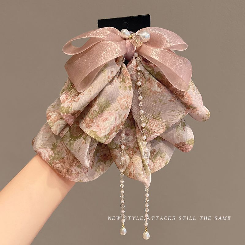 2025 dulce clip de cabello de arco de la cabeza detrás del clip de cabello medio atado temperamento elegante bordilla clip de tiburón explosión