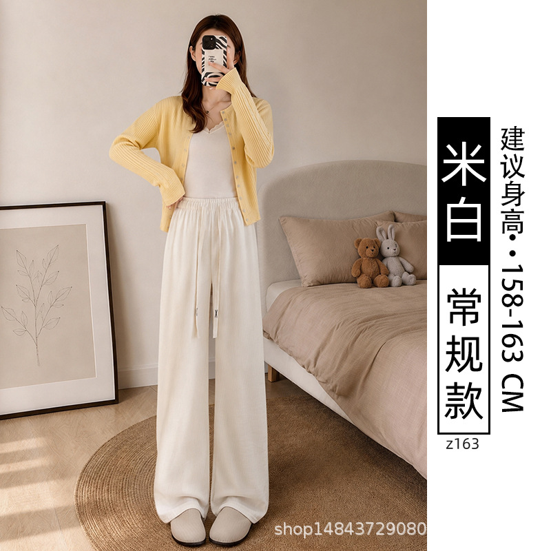 Pantalones blancos de piernas anchas de mujer primavera y otoño 2026 nuevo tipo de cintura alta suelta perezoso pequeño casual pantalones de punto recto estrechos