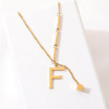 Fashionable brand small design pendant with tassels with letters, necklace stainless steel, accessory, European style, trend of season, does not fade