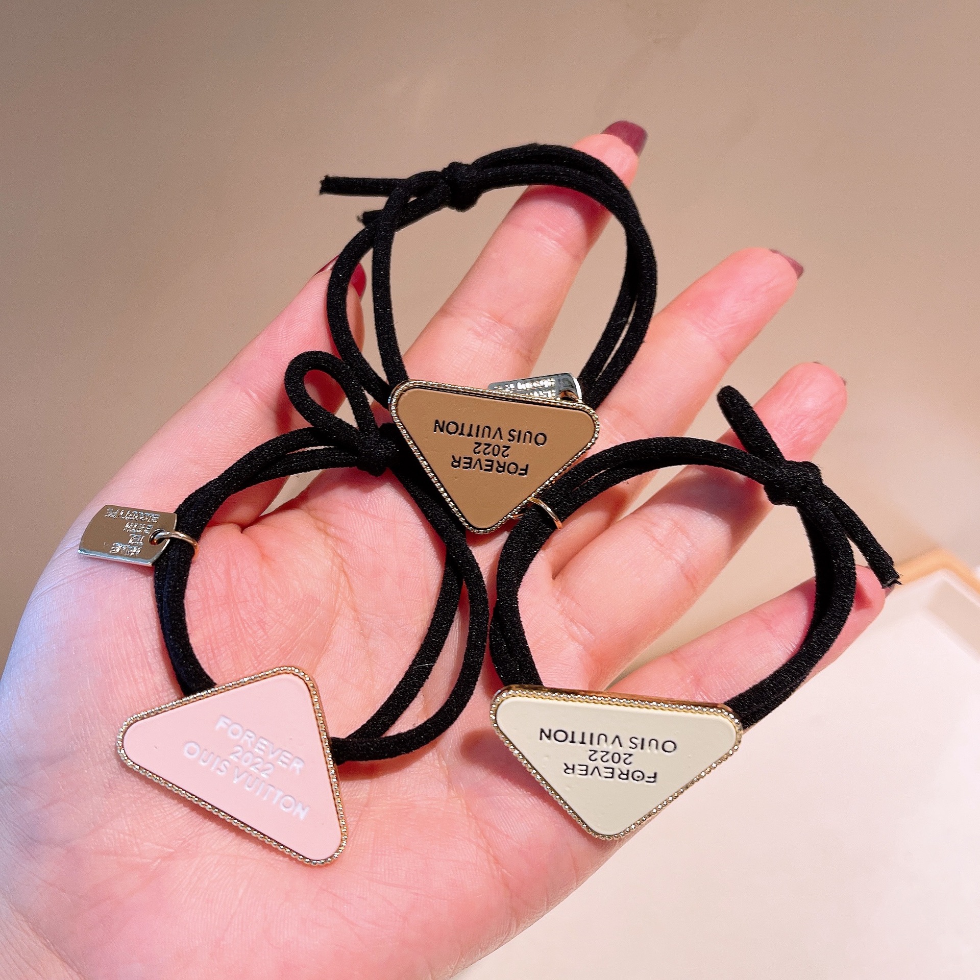 Fashion Inverted Triangle Letters Solid Color Hair Scrunchies Wholesale Nihaojewelry display picture 11