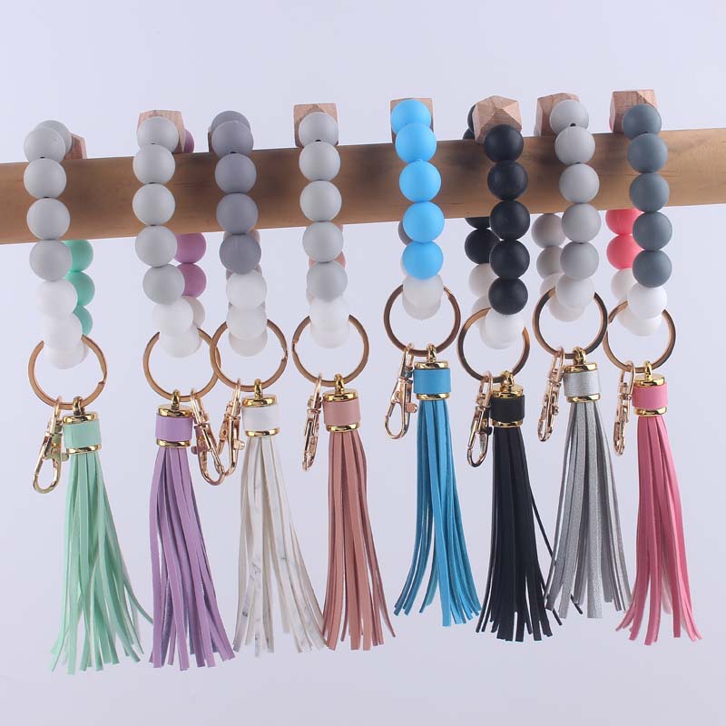 Pulsera de silicona pulsera llavero nuevo creativo DIY borla colgante contraste color