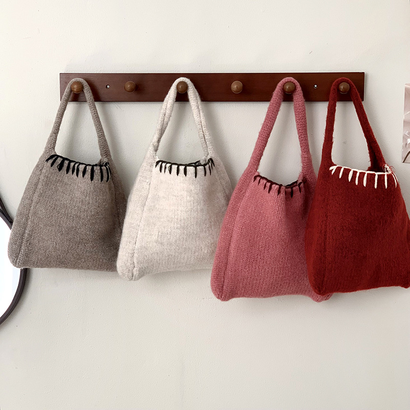 Bolsas de punto otoño y invierno nueva atmósfera bolsas de cesta de verduras bolsas de tejido a mano bolsas de lana de moda bolsas de hombro