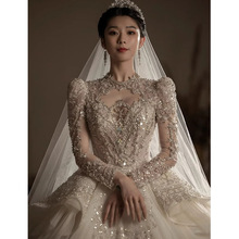 在逃公主婚纱礼服女2025新款新娘重工奢华大拖尾长袖高级质感主纱