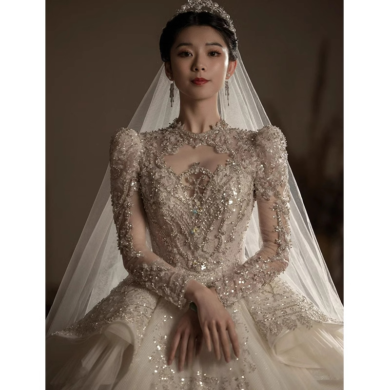 在逃公主婚纱礼服女2025新款新娘重工奢华大拖尾长袖高级质感主纱