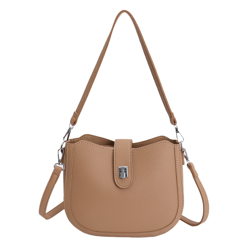 Hot sale nuevo nicho coreano litchi estampado bolso de cubo de hombro para mujeres sensación de lujo ligero versátil bolso de transporte de viaje