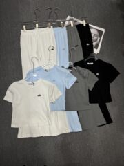 女性のためのファッショナブルなカジュアルスポーツスタイルスーツ春と夏の新しい刺繍レター半袖Tシャツ+ハイウエストブーツカットパンツ2点セット