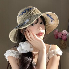 花朵草帽女夏季新款镂空遮阳防晒编织渔夫帽法式海边沙滩度假帽子
