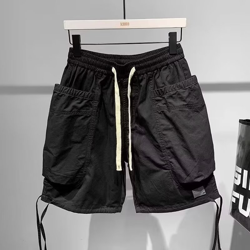 Monos de moda casuales de verano, pantalones de cinco puntos, pantalones cortos casuales microelásticos y transpirables para hombres, nuevos pantalones cortos multibolsillos