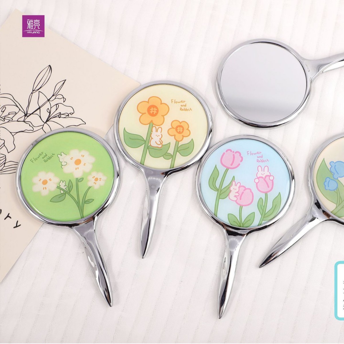 Suministro directo de fábrica regalos promocionales ronda pequeña manija espejo portátil conveniente espejo cosmético logotipo personalizado regalo