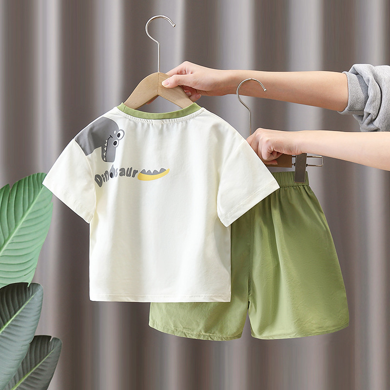 8130 traje de verano para niños 2025 nuevos pantalones cortos de manga corta de dinosaurio para niños de dos piezas ropa de verano para bebés de moda
