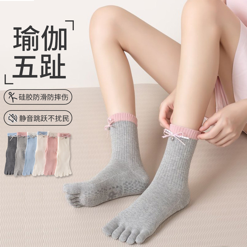 Five-toe yoga socks for women, mid-calf length, with silicone anti-slip and silent design, featuring a bow and separate toe compartments, suitable for fitness, dance, and Pilates Five-toe yoga socks for women, mid-calf length, with silicone anti-slip and silent design, featuring a bow and separate toe compartments, suitable for fitness, dance, and Pilates