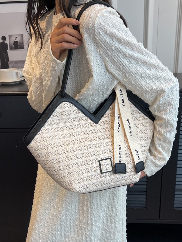 Bolsa de paja trenzada para mujeres verano 2026 nuevo paquete de hombro versátil de gran capacidad textura popular bolsa de viaje