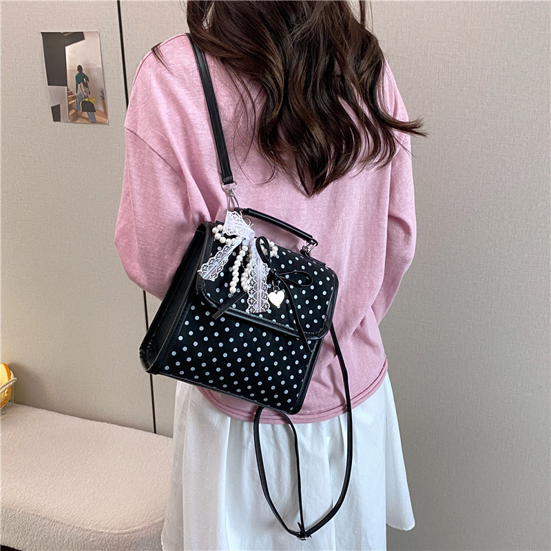 Bolsa de moda coreana lindas bajo las axilas 2026 primavera nueva bolsa de viaje simple, mochila de moda casual de alto valor.